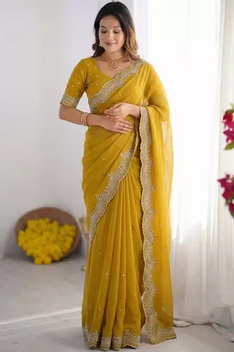 yellow embellished beads and stones poly georgette heavy work saree