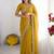 yellow embellished beads and stones poly georgette heavy work saree