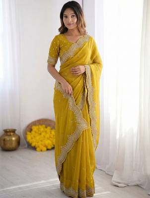yellow embellished beads and stones poly georgette heavy work saree 3