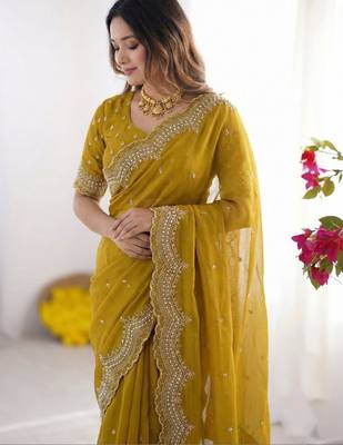 yellow embellished beads and stones poly georgette heavy work saree 4