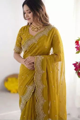 yellow embellished beads and stones poly georgette heavy work saree