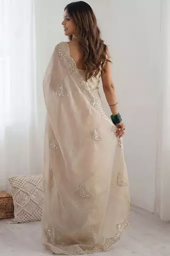 Cream embellished sequinned organza heavy work saree