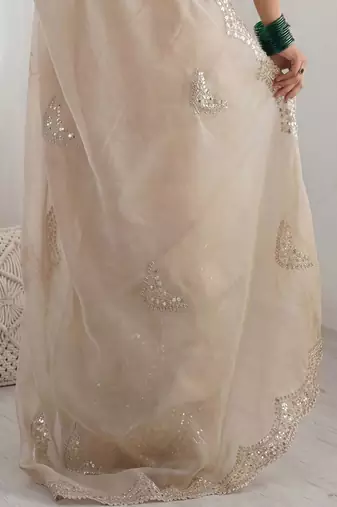 Cream embellished sequinned organza heavy work saree