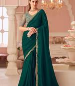 Green sequinned pure georgette saree