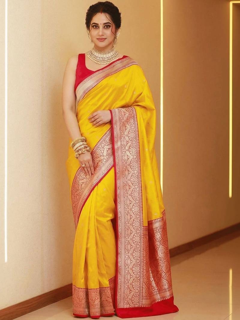 Yellow woven design zari silk blend heavy work banarasi saree
