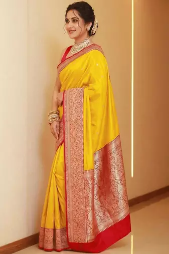 Yellow woven design zari silk blend heavy work banarasi saree