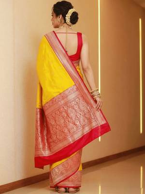 Yellow woven design zari silk blend heavy work banarasi saree 3