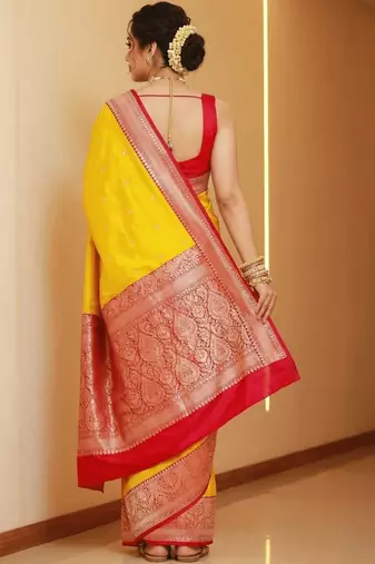 Yellow woven design zari silk blend heavy work banarasi saree