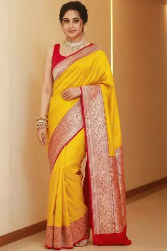 Yellow woven design zari silk blend heavy work banarasi saree