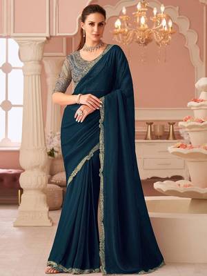 Teal sequinned pure georgette saree 1