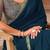 Teal sequinned pure georgette saree