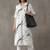 smart women printed regular kurta with trousers