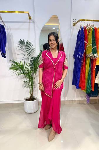 Bold pink blazer with drape skirt