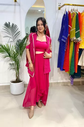Bold pink blazer with drape skirt