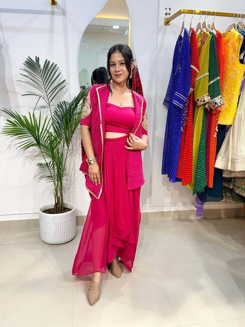 Bold pink blazer with drape skirt