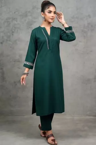 classic women embroidered regular thread work kurta with trousers