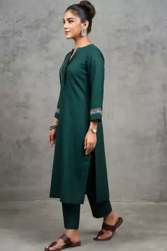 classic women embroidered regular thread work kurta with trousers