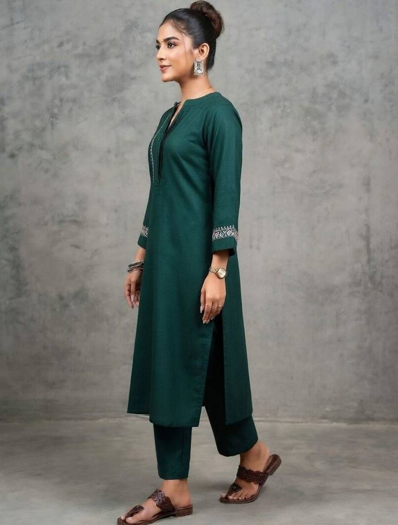 classic women embroidered regular thread work kurta with trousers