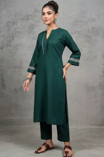 classic women embroidered regular thread work kurta with trousers
