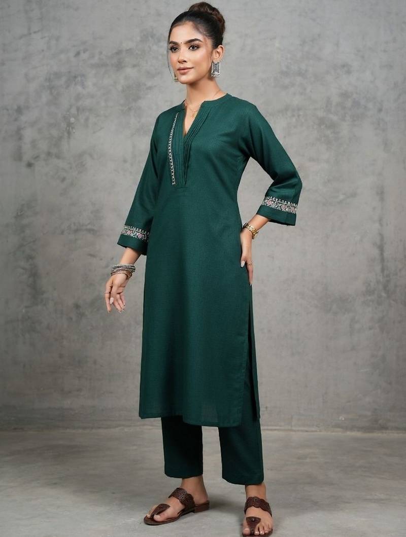 classic women embroidered regular thread work kurta with trousers