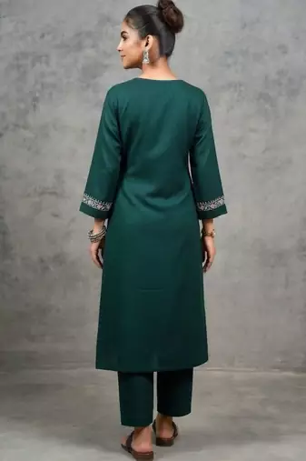 classic women embroidered regular thread work kurta with trousers