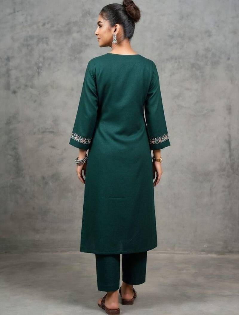 classic women embroidered regular thread work kurta with trousers