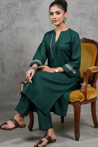 classic women embroidered regular thread work kurta with trousers