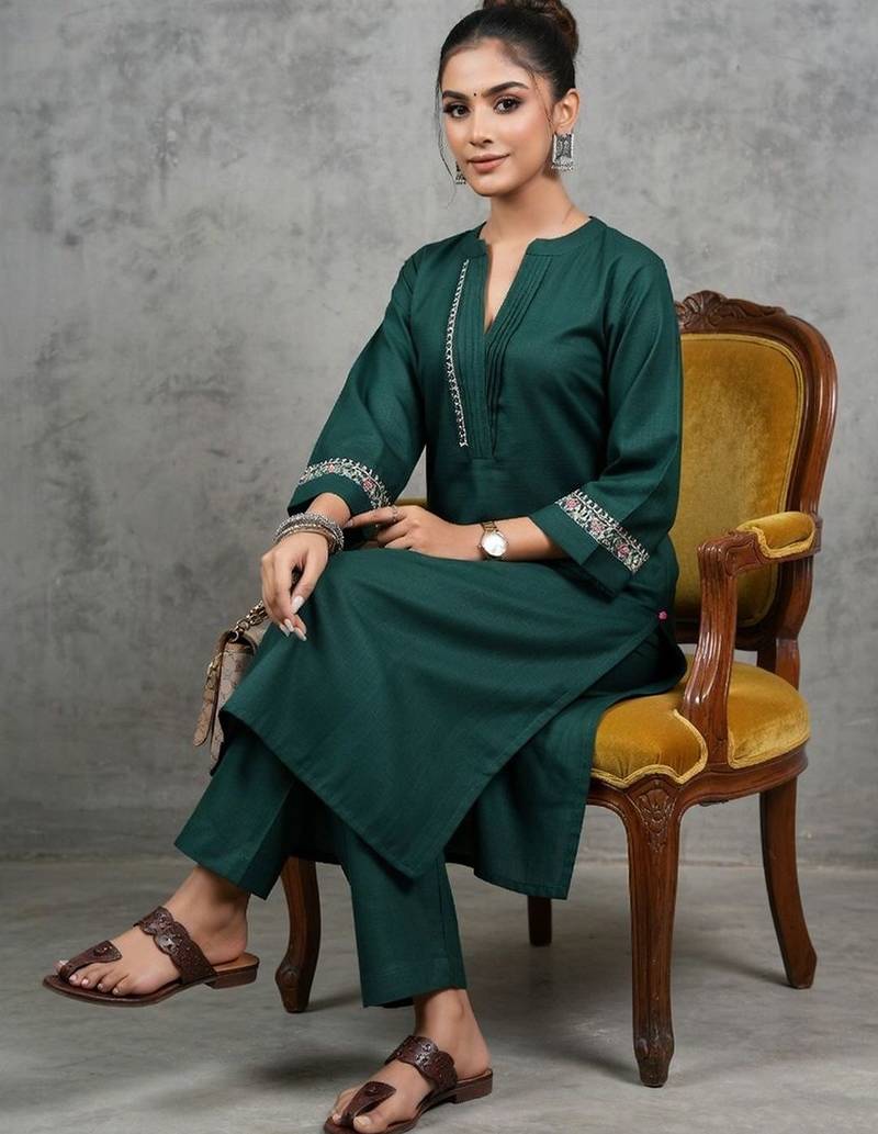 classic women embroidered regular thread work kurta with trousers