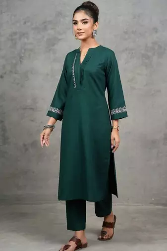 classic women embroidered regular thread work kurta with trousers