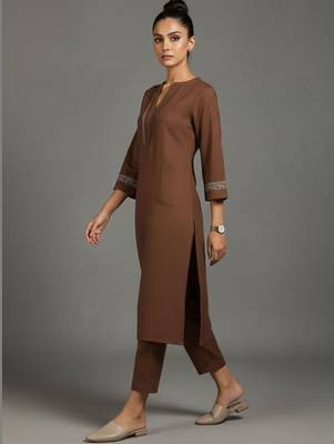 women embroidered sleek thread work work kurta with trousers 2