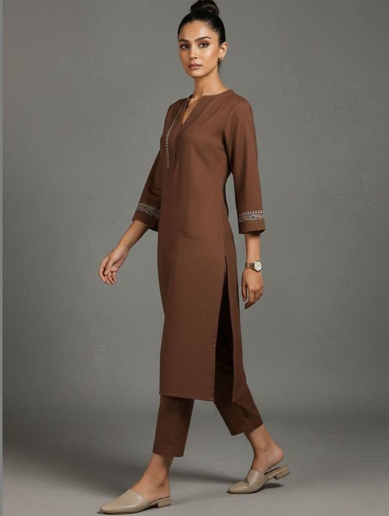 women embroidered sleek thread work work kurta with trousers