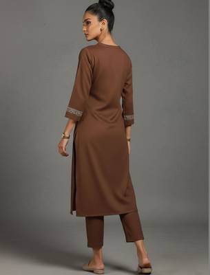 women embroidered sleek thread work work kurta with trousers 4