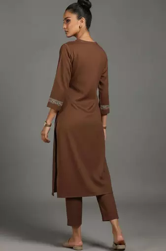 women embroidered sleek thread work work kurta with trousers