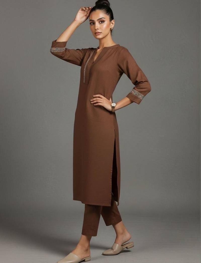 women embroidered sleek thread work work kurta with trousers
