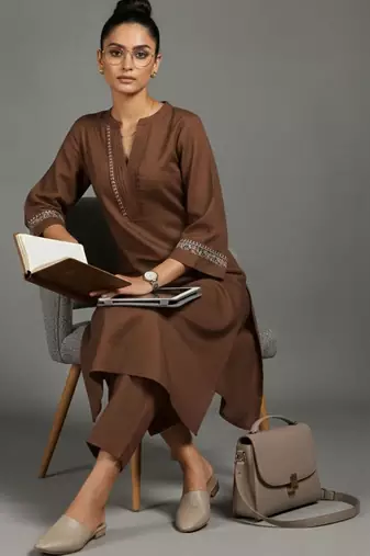women embroidered sleek thread work work kurta with trousers