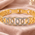 Gold-toned crystal studded circle link kada bracelet
