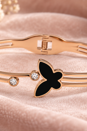 Rose gold butterfly bangle bracelet with black enamel & crystal