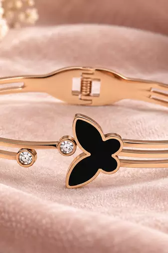 Rose gold butterfly bangle bracelet with black enamel & crystal