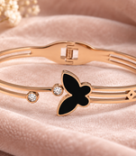 Rose gold butterfly bangle bracelet with black enamel & crystal
