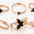 Rose gold butterfly bangle bracelet with black enamel & crystal