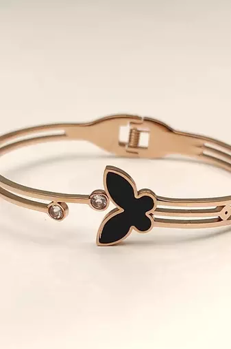 Rose gold butterfly bangle bracelet with black enamel & crystal