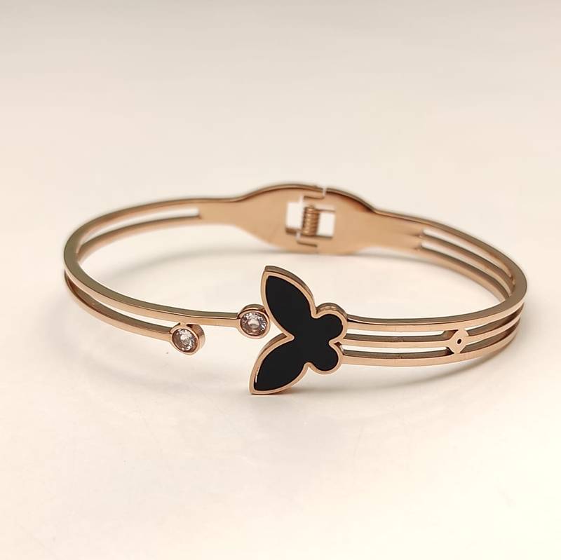 Rose gold butterfly bangle bracelet with black enamel & crystal
