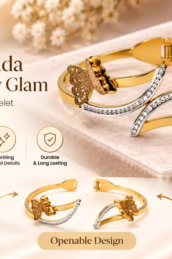 Gold-tone butterfly bangle bracelet with crystal embellishments