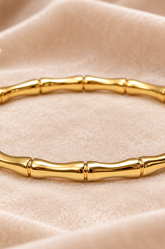 Gold-toned bamboo design bangle bracelet for women