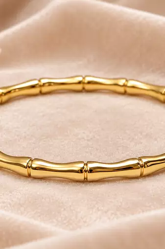 Gold-toned bamboo design bangle bracelet for women