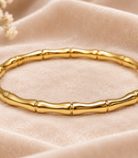 Gold-toned bamboo design bangle bracelet for women