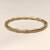 Gold-toned bamboo design bangle bracelet for women