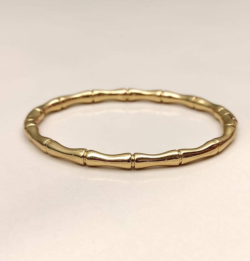 Gold-toned bamboo design bangle bracelet for women