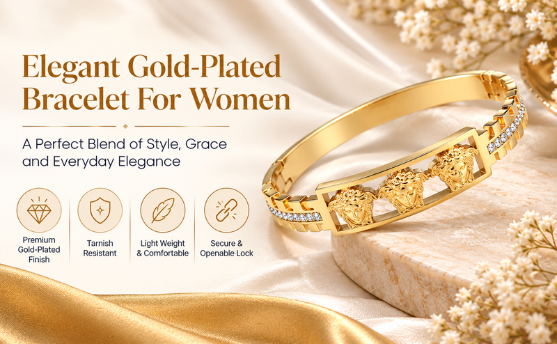 Gold-tone medusa bangle bracelet with crystal accents