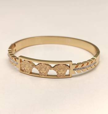 Gold-tone medusa bangle bracelet with crystal accents 4